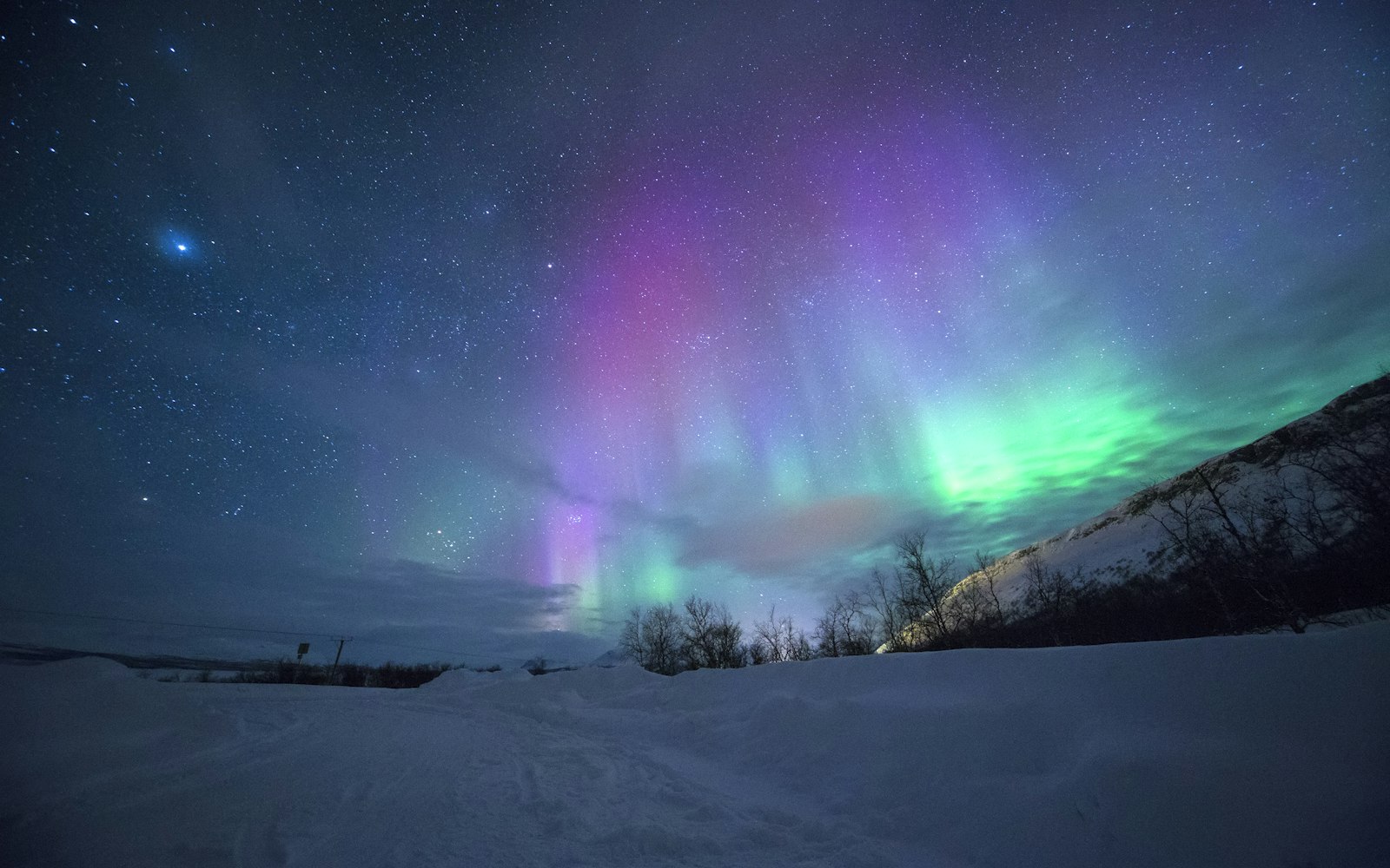 Aurora over a snow plain